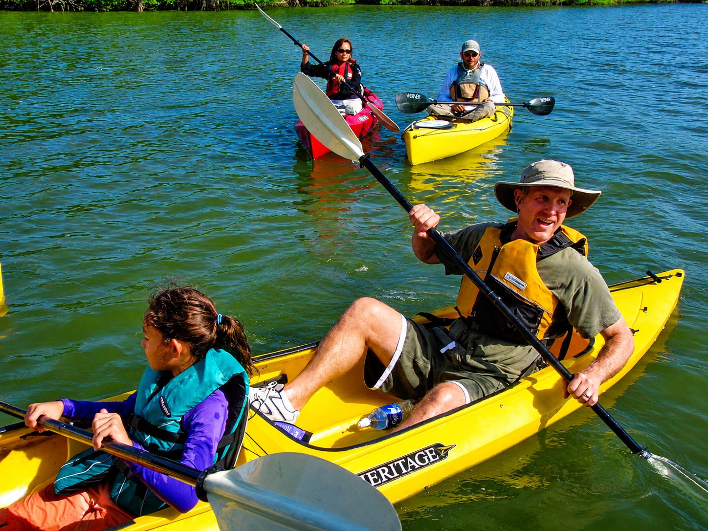 Launching kayaks for overnight sea kayak camping trip in the Everglades